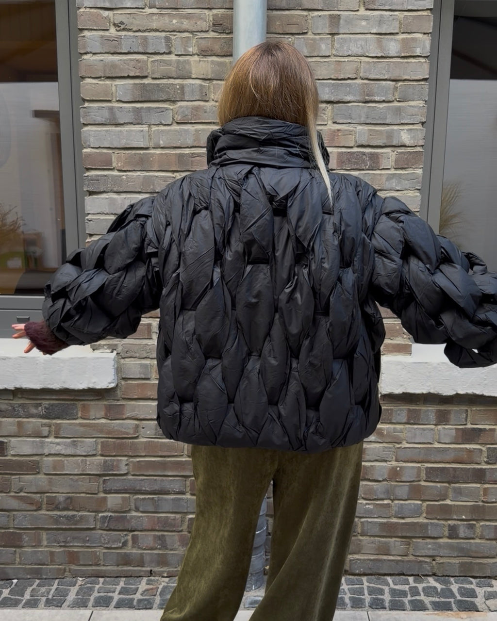 Pufferjacke 'Ge1flochten' schwarz